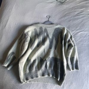 Green knitted crew neck sweater
